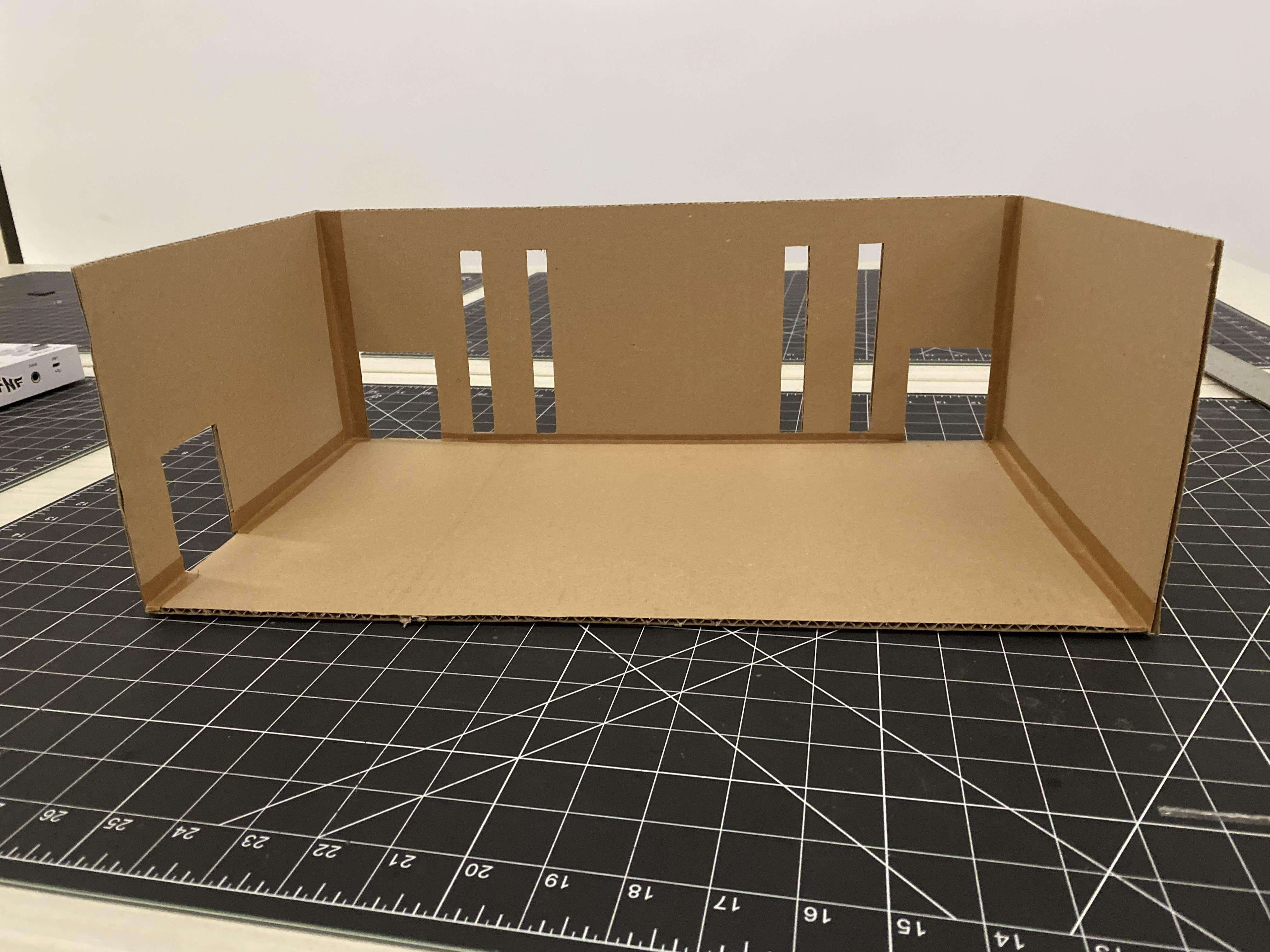 Using fabrication techniques learned from the workshop, I created a cardboard model of the Marquee. I used cardboard tape to clean up the edges of the connecting sides pieces.
