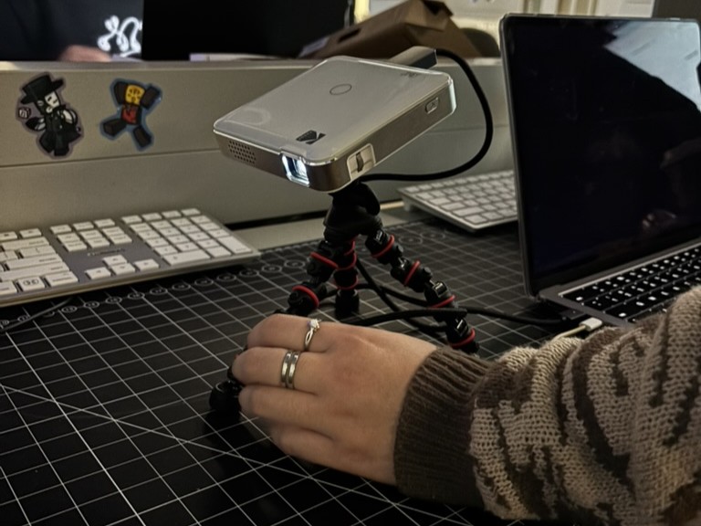 Testing projecting onto the cardboard model using a miniature projector.